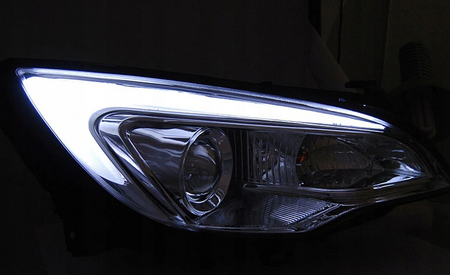 Svetlomety Opel Astra J 10-15 Tube Light Chrome